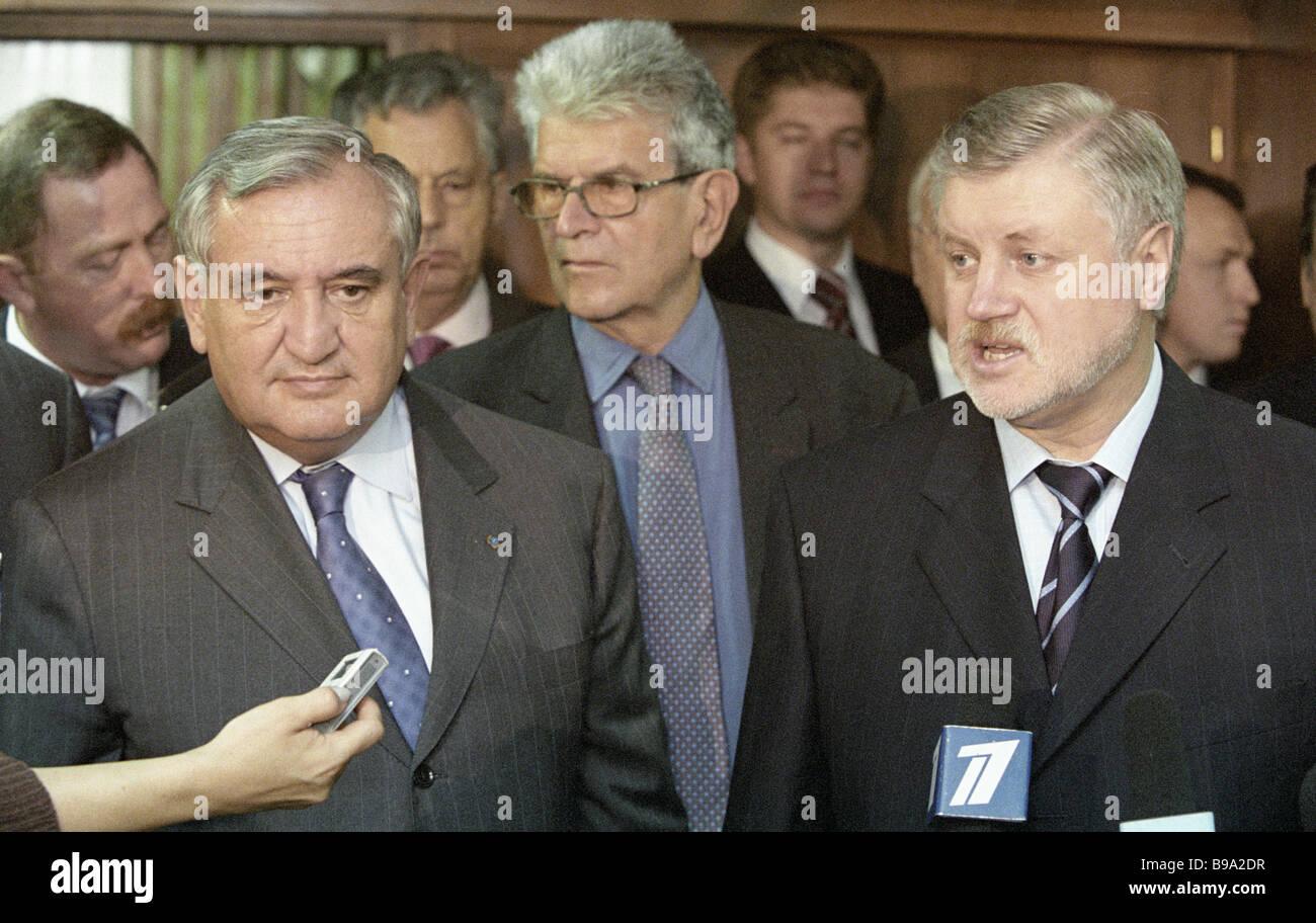 French Prime Minister Jean Pierre Raffarin left and Federation Council Speaker Sergei Mironov right Stock Photo