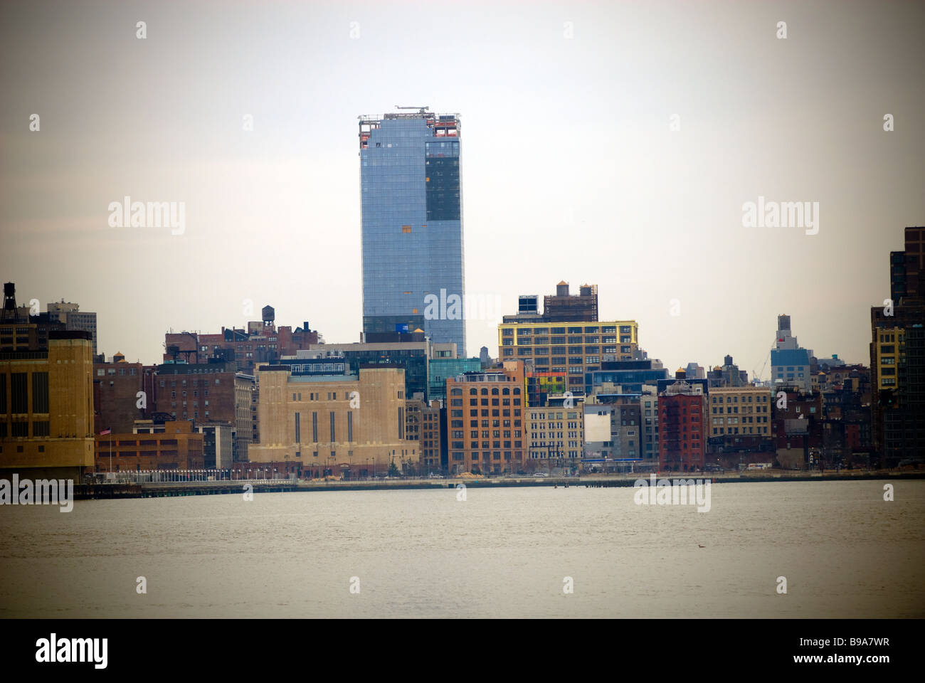 The Trump Soho Hotel Condominium on Spring Street towers above neighboring buildings Stock Photo