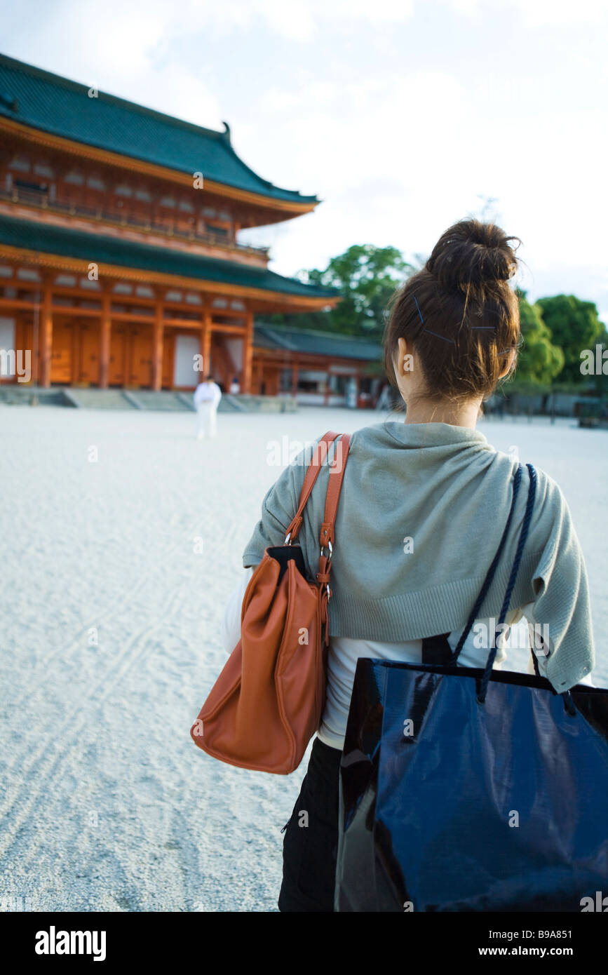 Female approaching Japanese temple, rear view Stock Photo Alamy