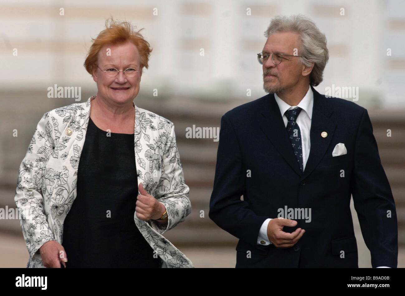 President of Finland Tarja Halonen and her spouse before the informal dinner of the G8 leaders Petrodvorets Peterhof Stock Photo
