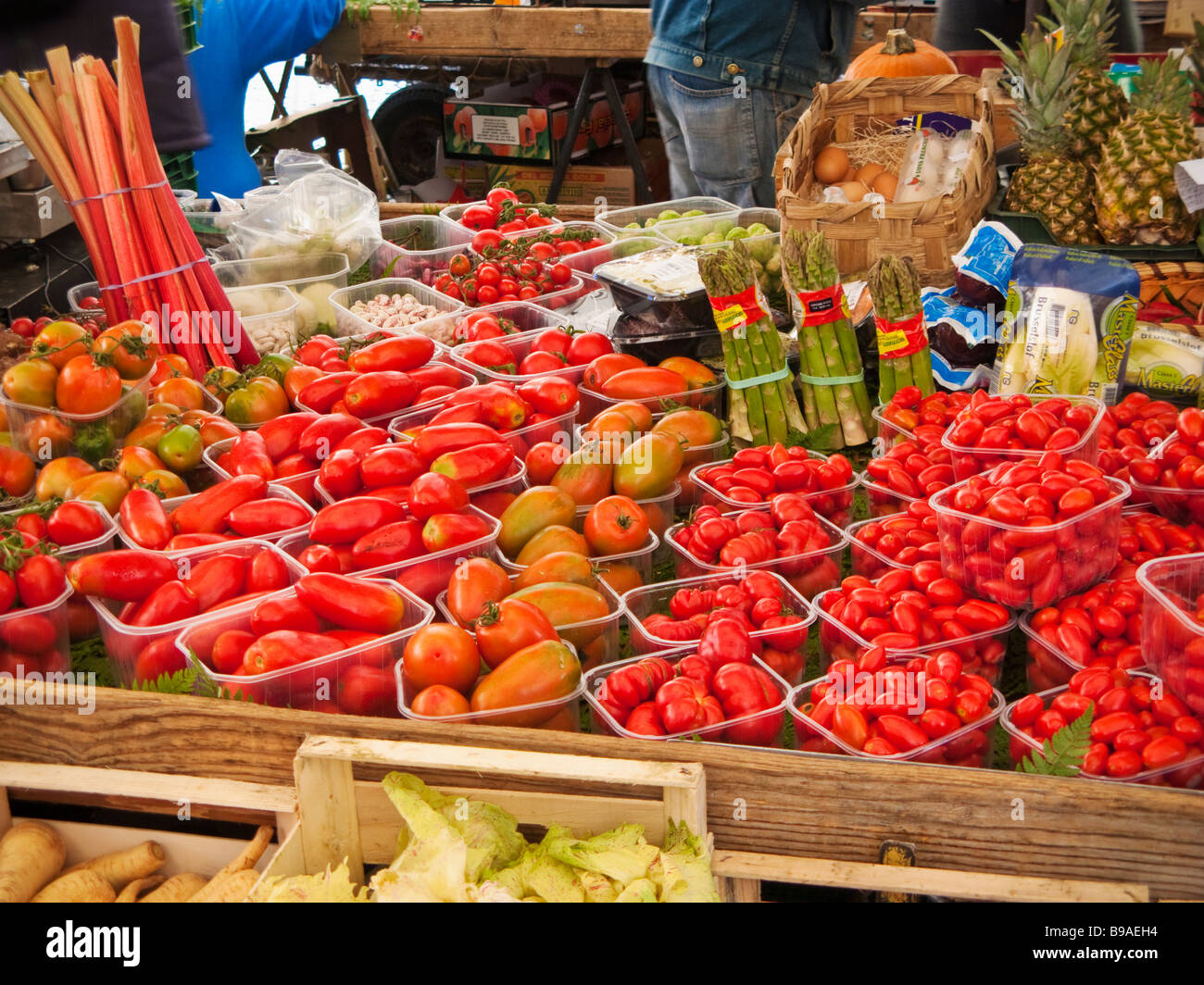 Italian market stall with a variety of tomatoes and other vegetables Stock Photo