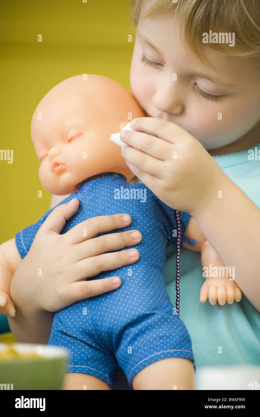 feeding doll