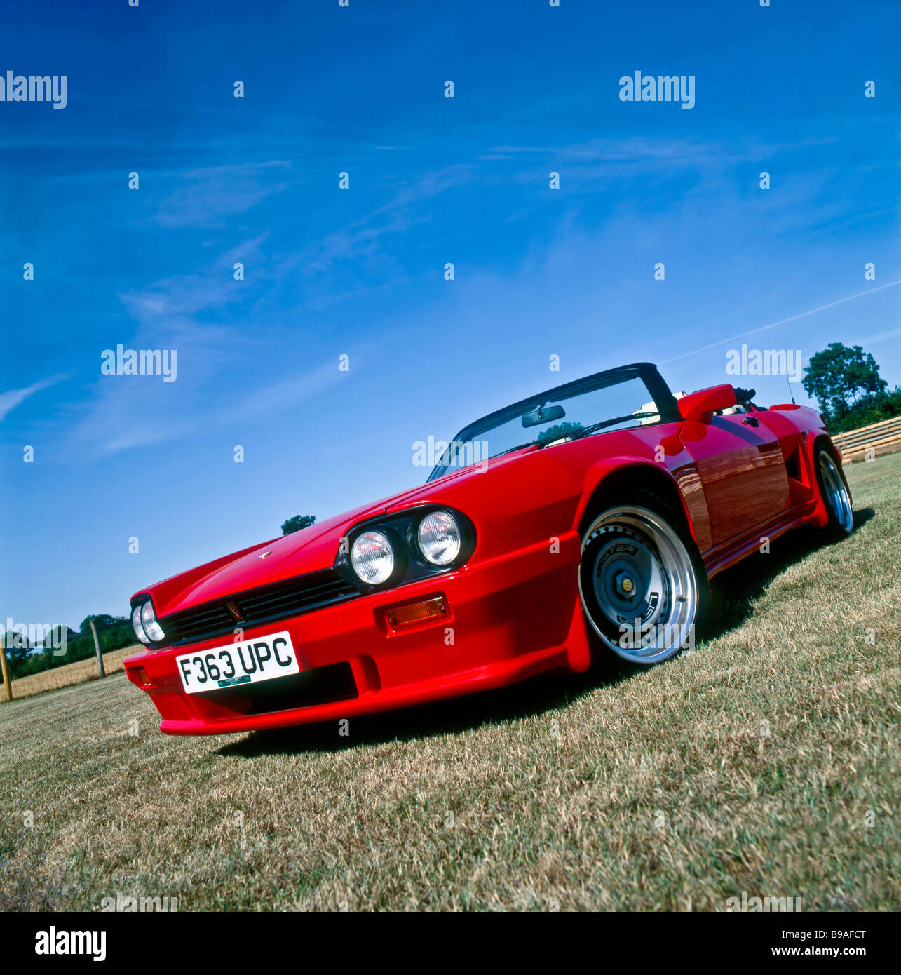 Jaguar Lister XJS Le Mans sports convertible 7.0 litre V12. Photographed in an English rural setting with deep blue summer sky. c.1989 Stock Photo