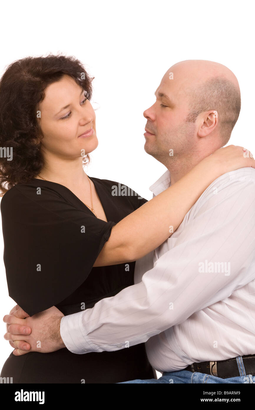 portrait of the happy couple on a white background Stock Photo - Alamy