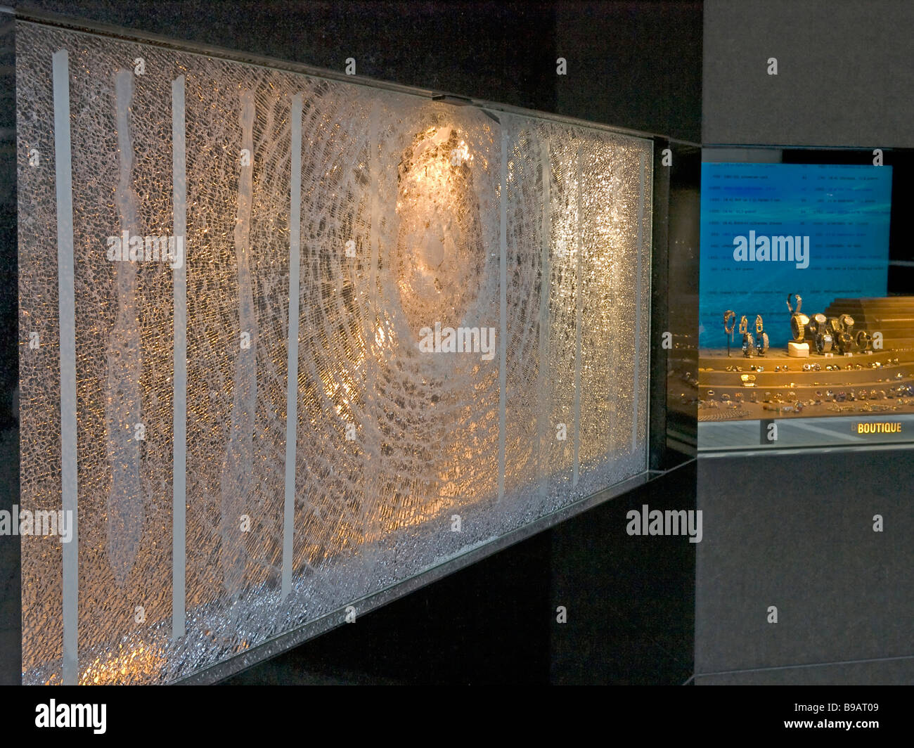 burglary wrecked broken glass plates of a display of a jewelry boutique
