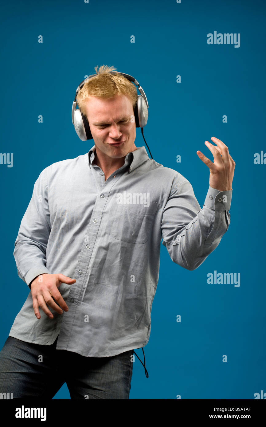 Man playing air guitar Stock Photo