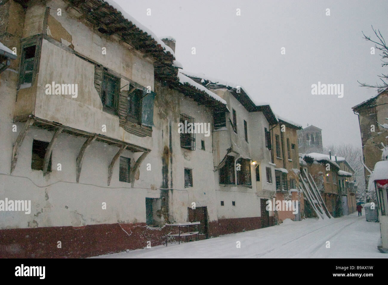 Old buildings covered by snow Stock Photo - Alamy