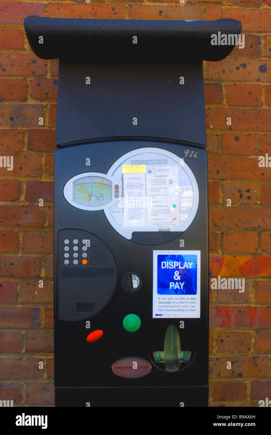 Ubiquitous parking 'Pay & display' meter on a North London street. Stock Photo