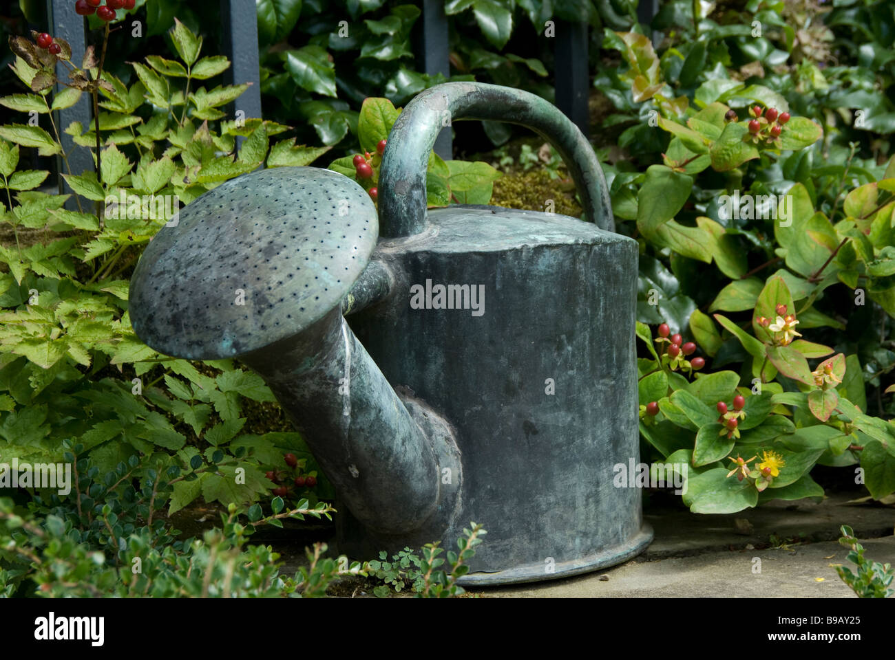 An ornamental watering can in the gardens at Hidcote Manor, a National