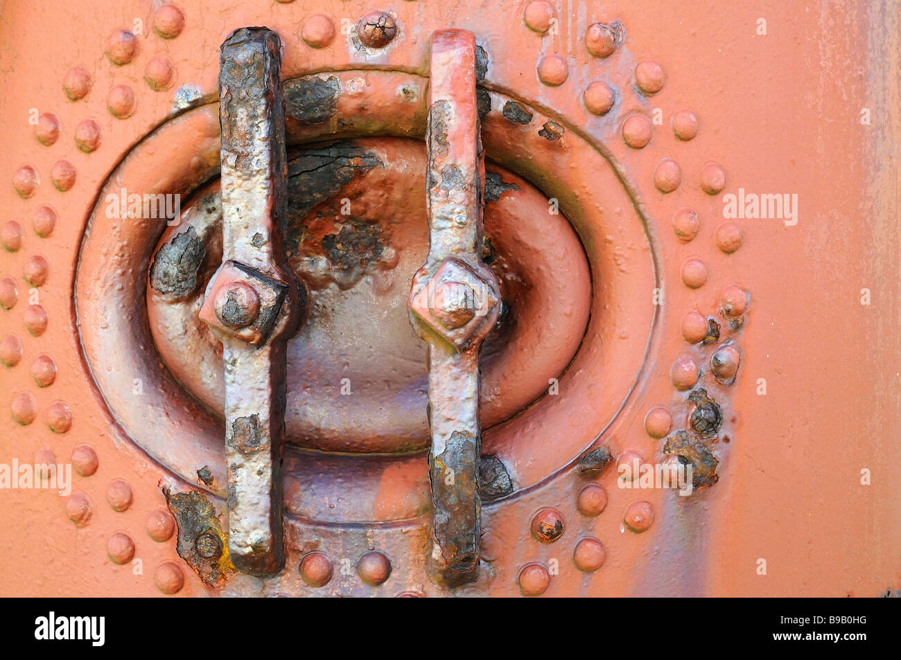 Detail of old boiler/tank. Access door with restraining/locking