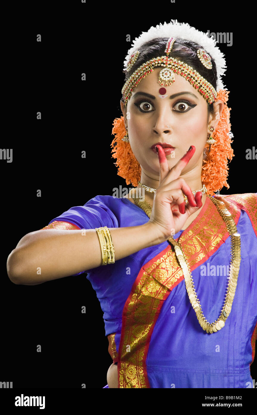 Woman with finger on lips hi-res stock photography and images - Alamy