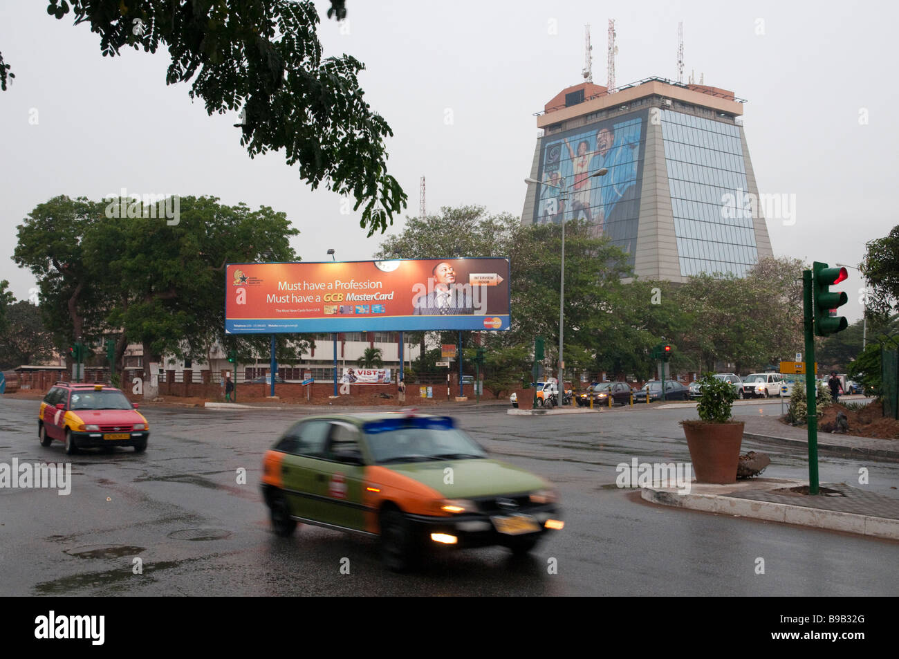West africa Ghana Accra Zain tower with advertising poster Stock Photo