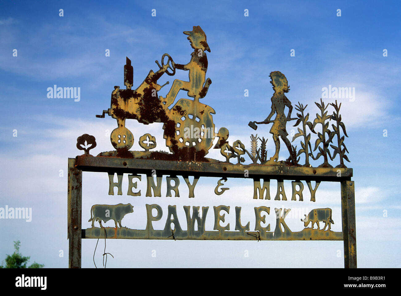 Wrought iron sign at entrance to farm in Panna Maria the oldest Polish