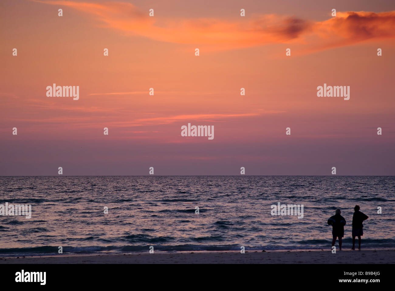 Senior silhouettes at sunset Stock Photo - Alamy