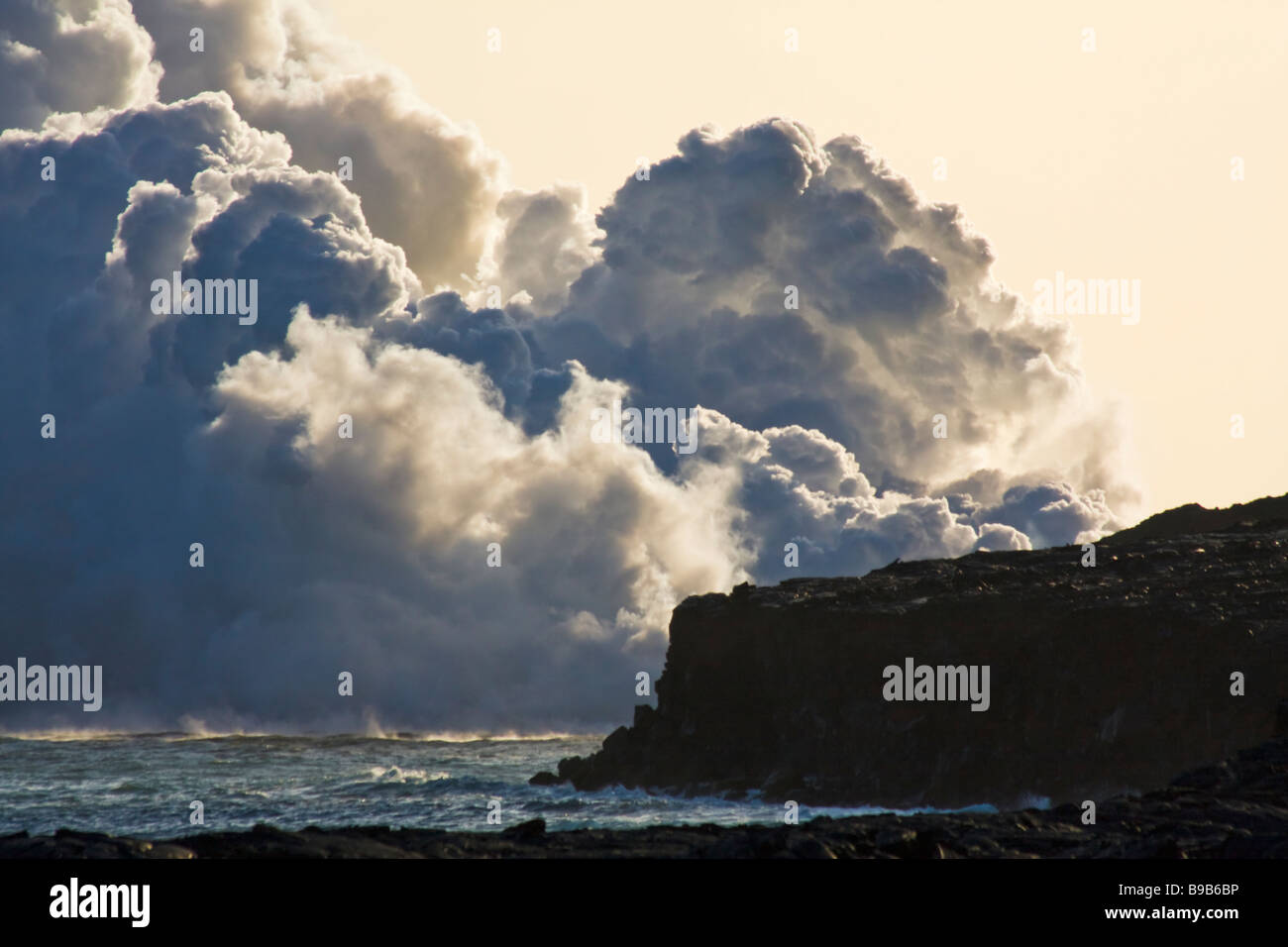 Lava flowing into the ocean near Kalapana, Big Island, Hawaii, USA Stock Photo