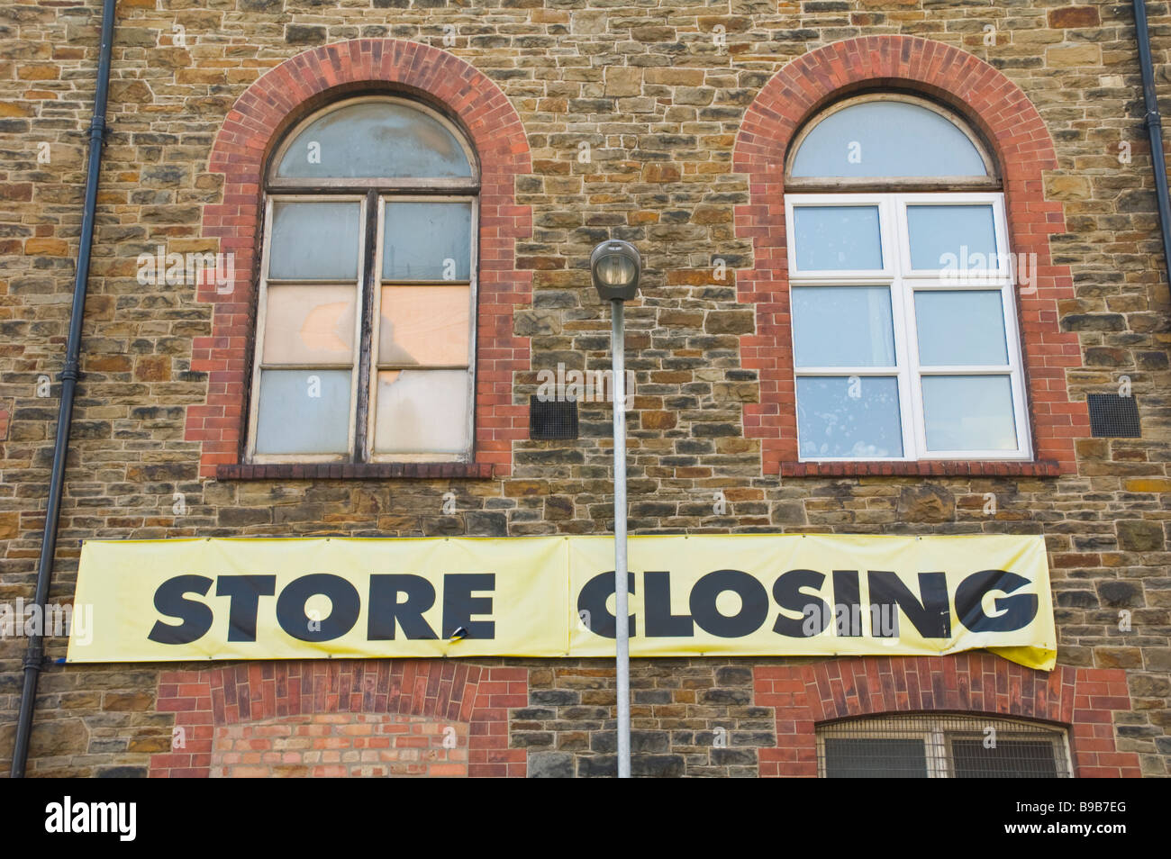 STORE CLOSING banner on wall under windows Newport South Wales UK Stock