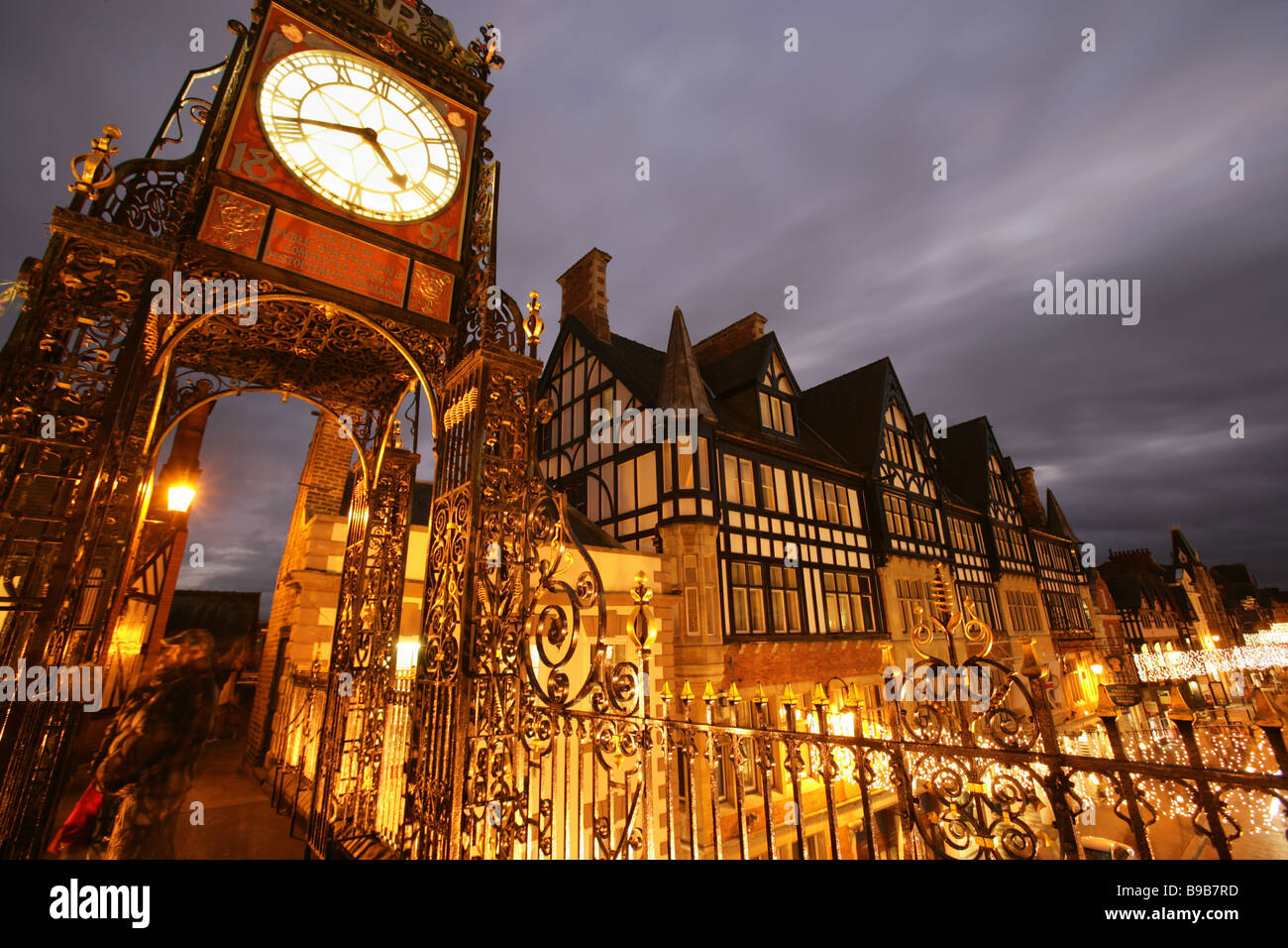 City of Chester, England. Dusk view of the Eastgate Clock, with Christmas street lights and decorations. Stock Photo