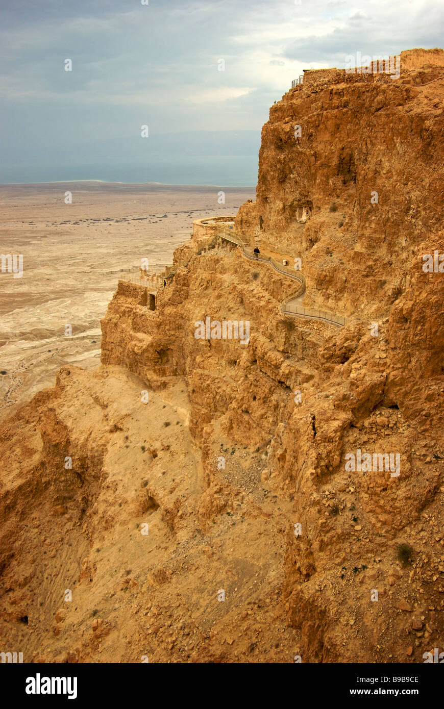 Cliff clinging path to part of King Herod's multi-level cliffside palace complex from fortress atop big mesa Stock Photo