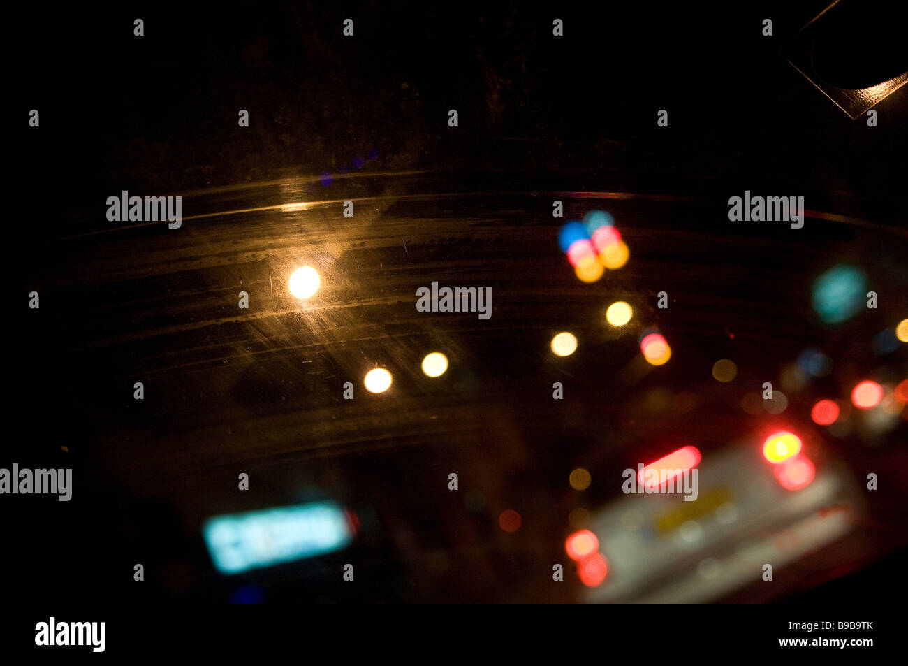 Blurred vision as seen through front car windshield at night in Tel Aviv Israel Stock Photo