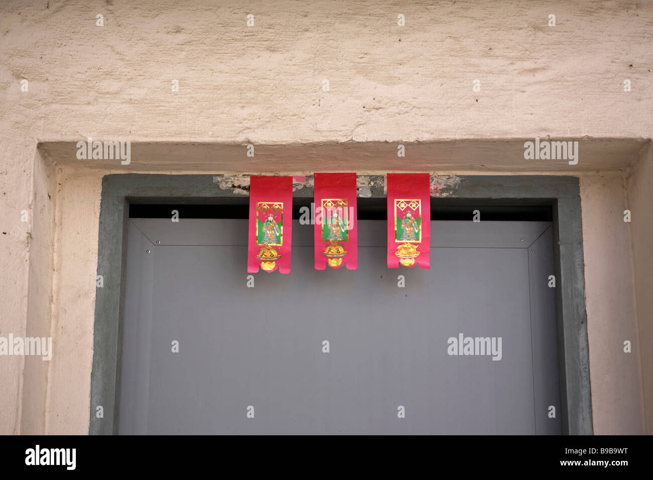 Red packets placed at door Stock Photo