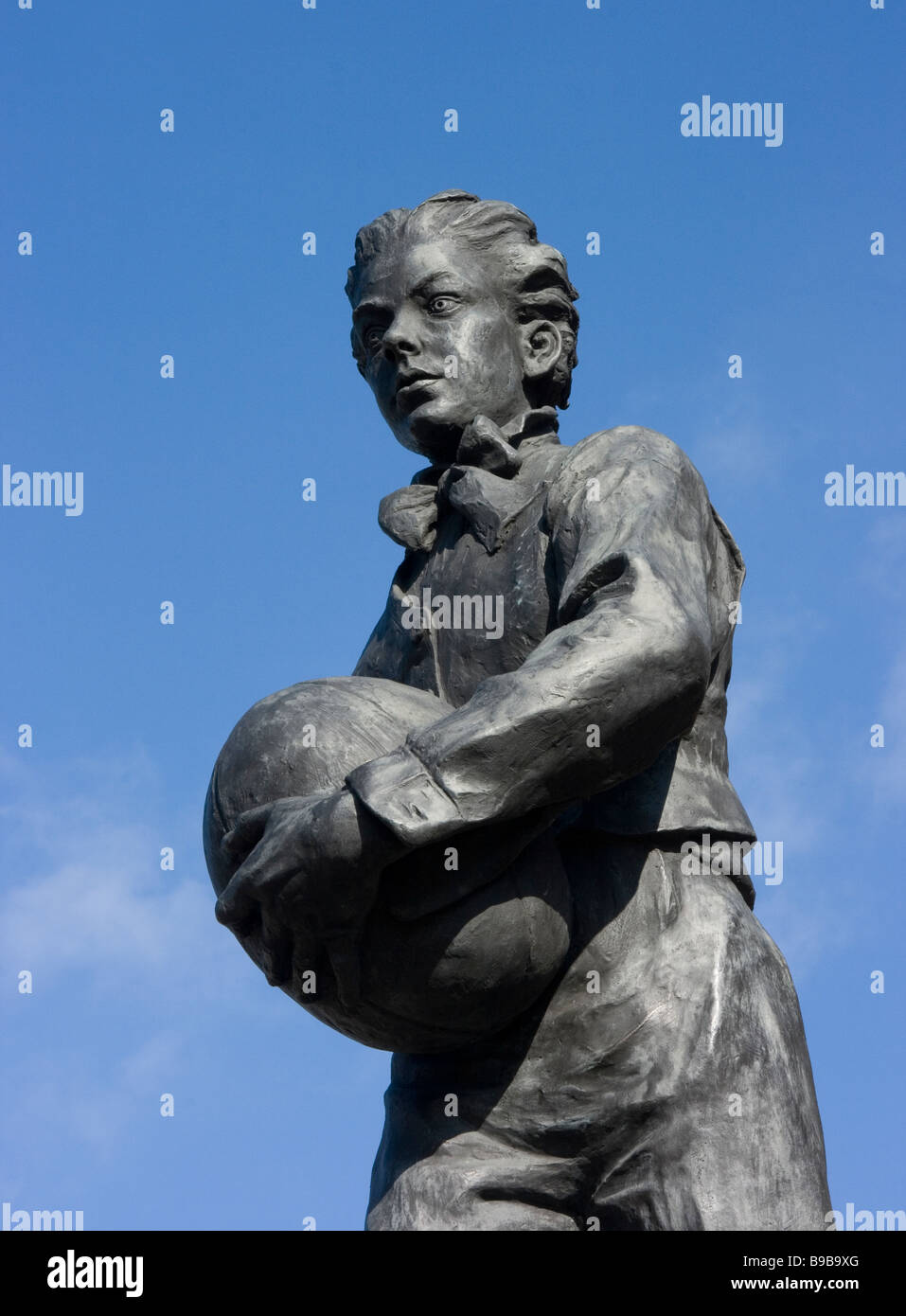 Statue of William Webb Ellis (1806 - 1872) outside Rugby School, Rugby, Warwickshire Stock Photo