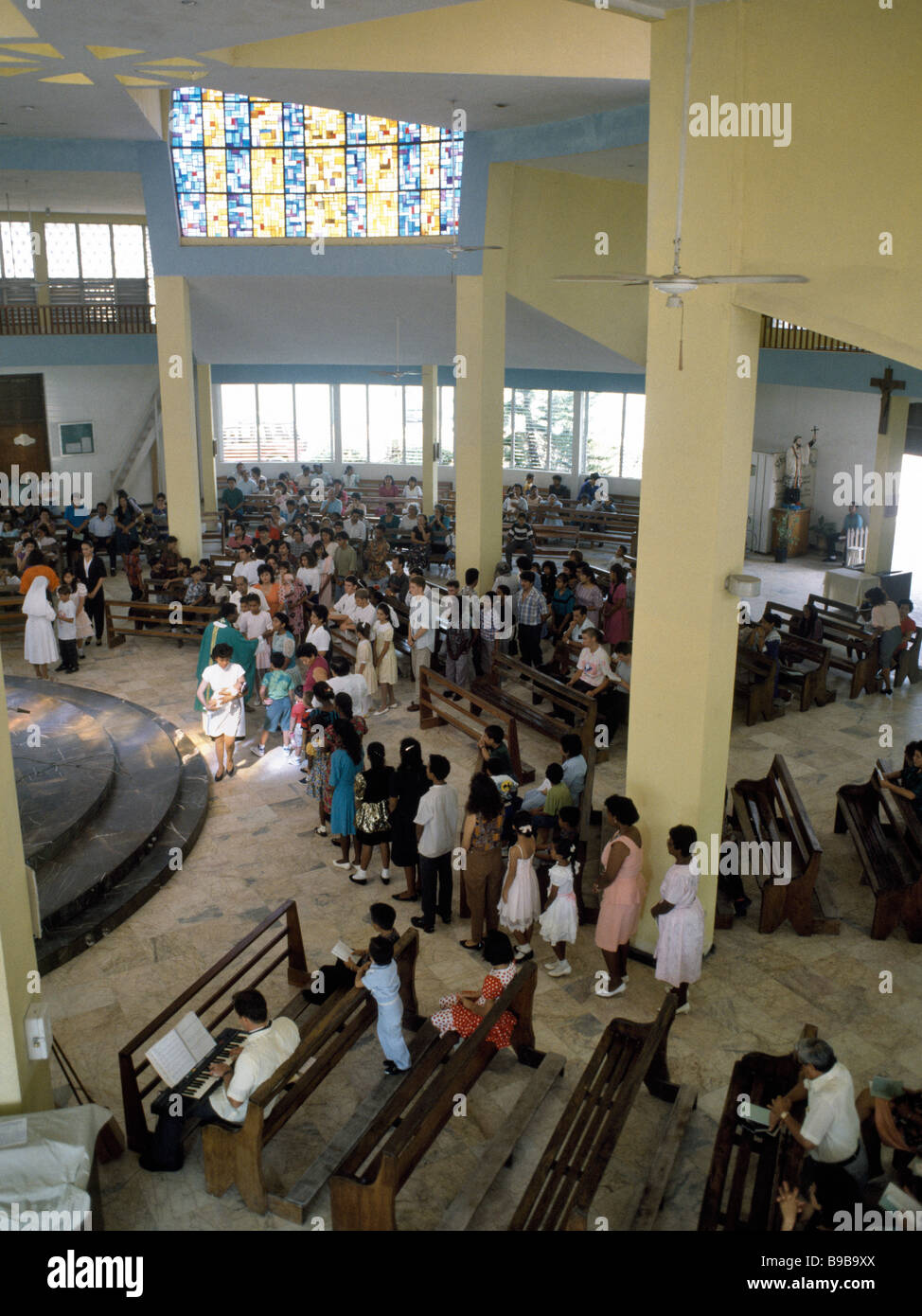 Mass taking place at St. Francis Xavier Catholic Church, Corozal, Belize, Central America Stock
