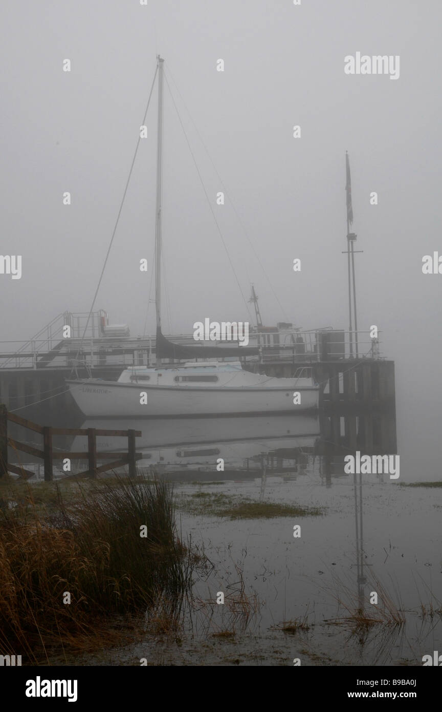 Glenridding Steamer Pier Ullswater on foggy winters day Stock Photo