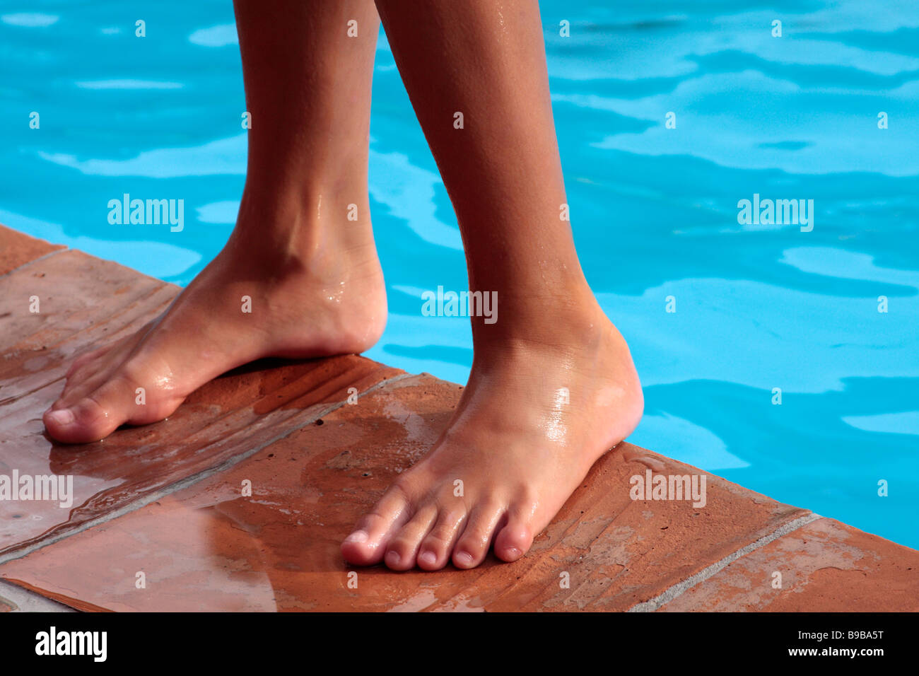 Boys Feet By A Swimming Pool Boys Feet By A Swimming Pool