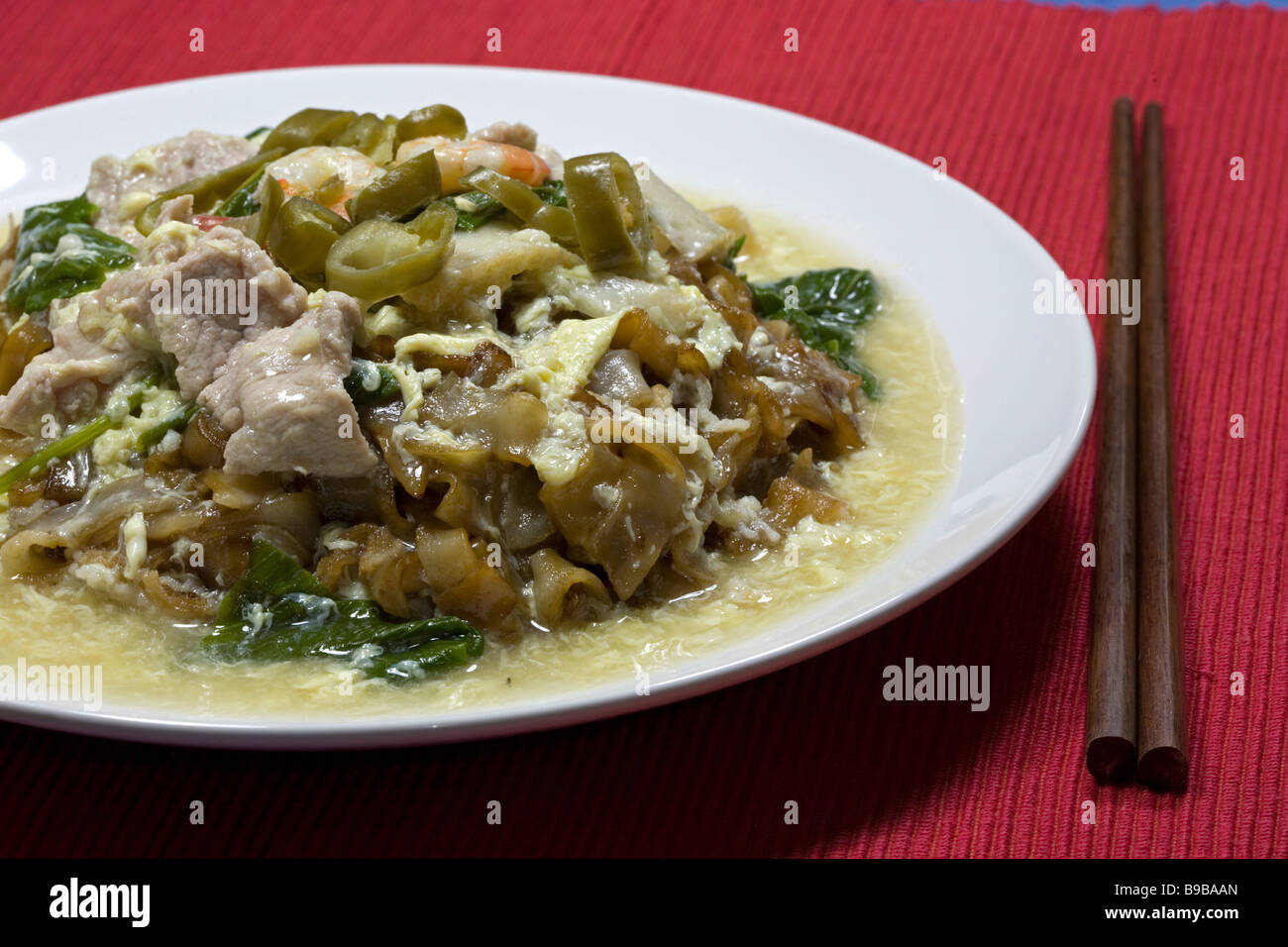Flat Rice Noodle with egg gravy aka Wat Tan Hor Fun Stock Photo Alamy