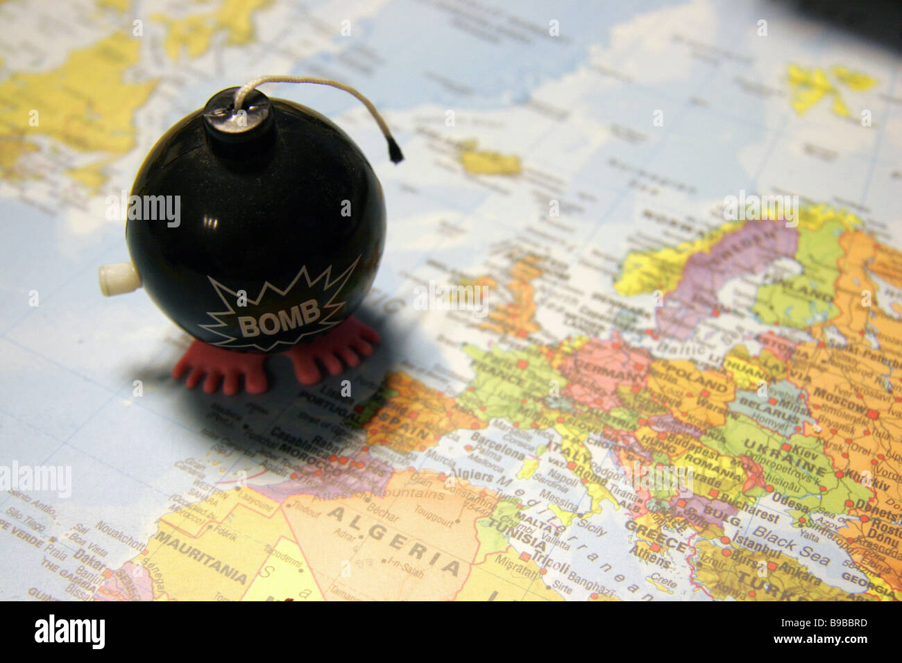 Bomb toy over map of Europe and North Africa Stock Photo