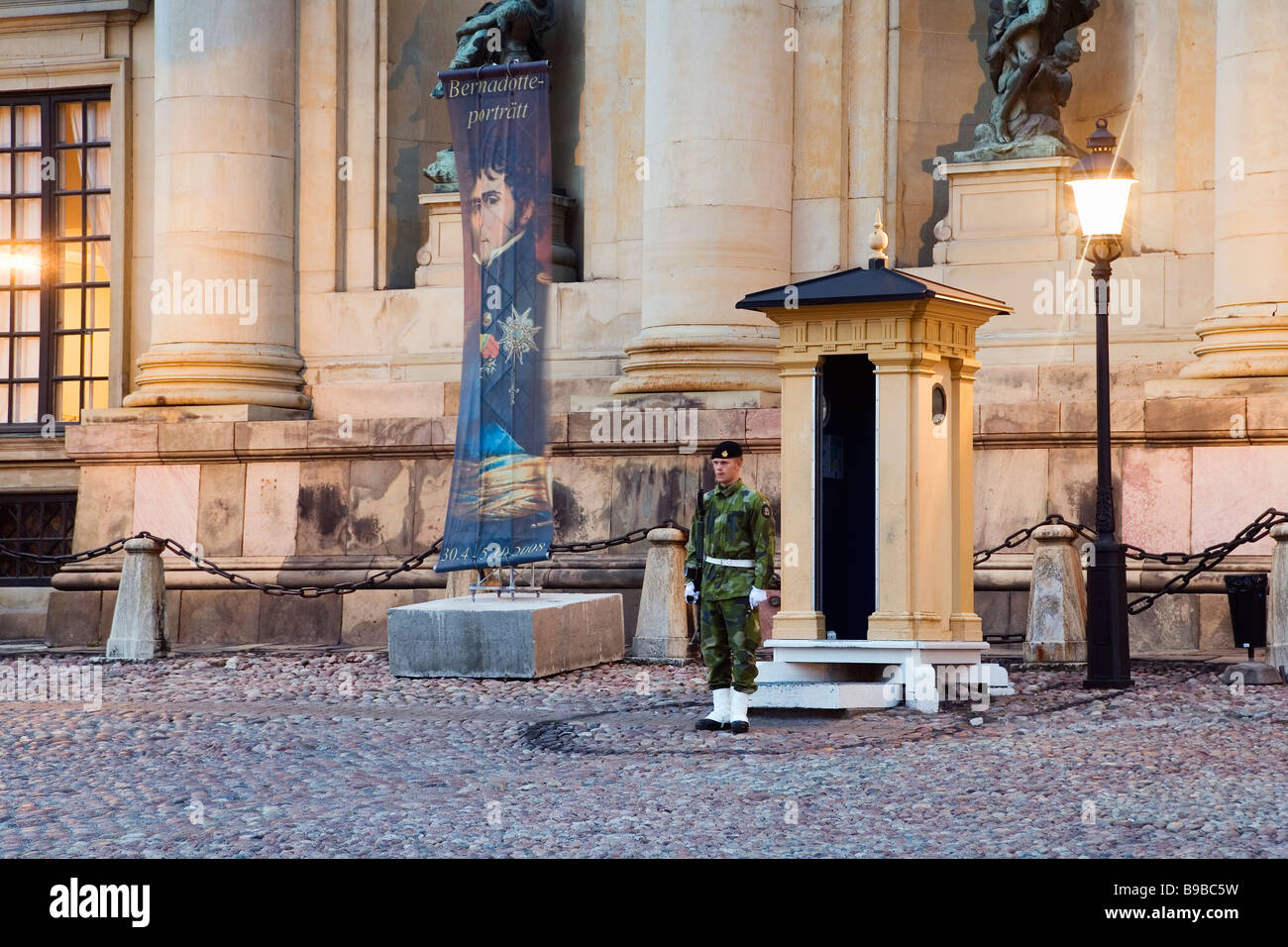 Stockholm, Sweden. Sentry at the Royal Palace Kungliga Slottet, dusk Stock Photo