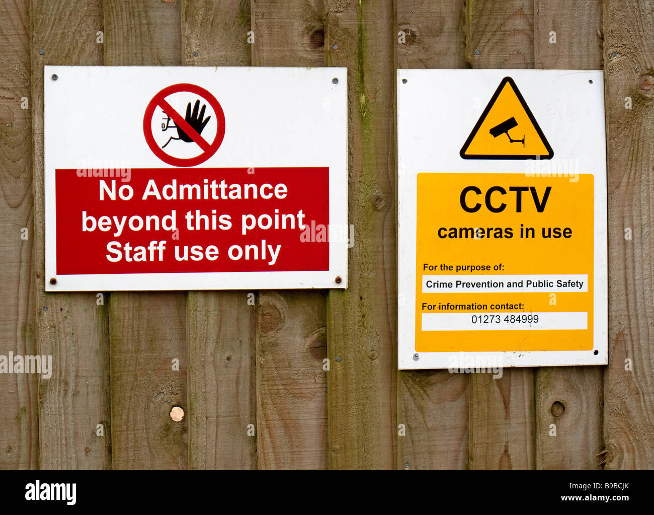 Warning signs on a fence Stock Photo Alamy