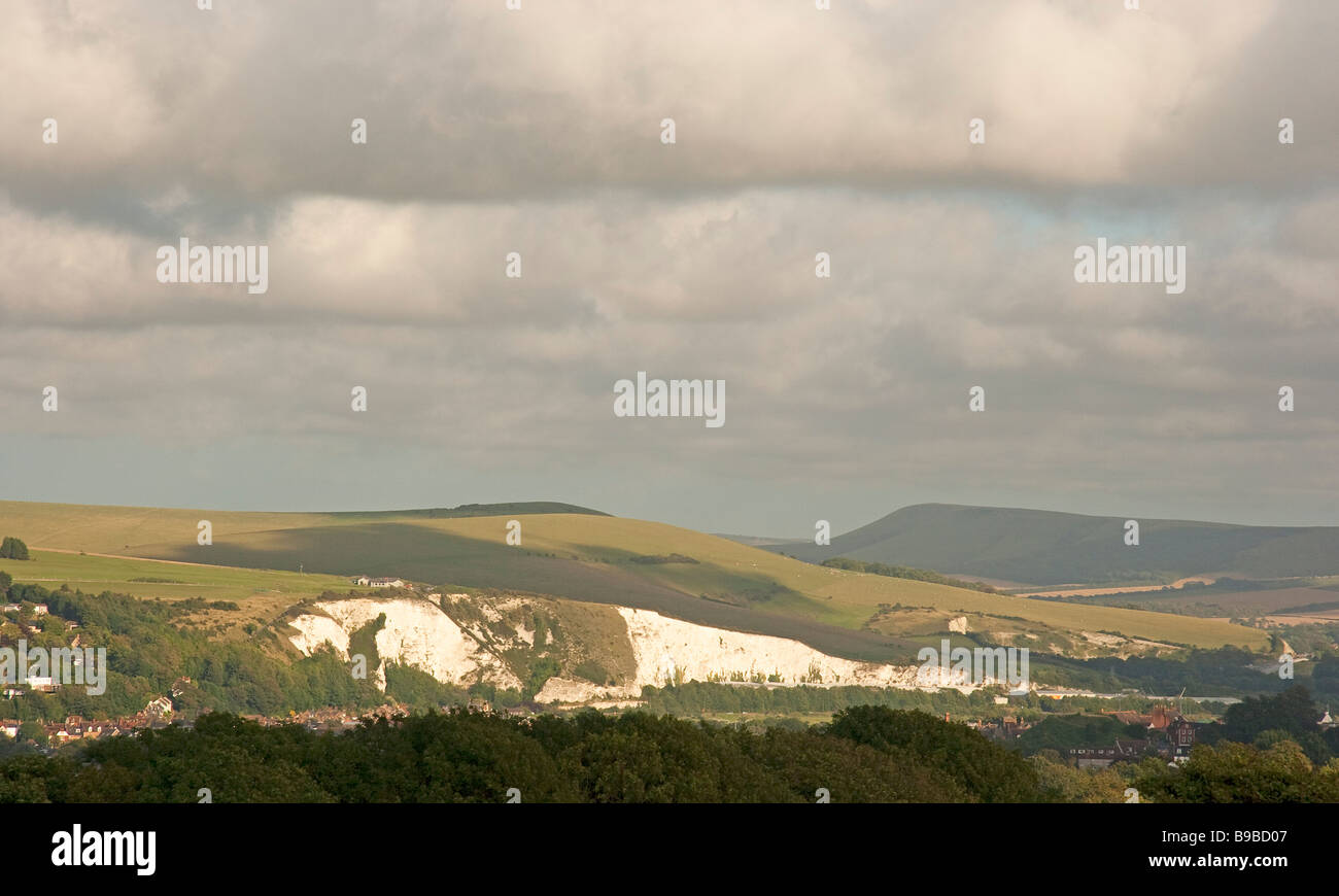 View in summer across the South Downs over Lewes looking towards Mount Caburn and Firle Beacon Stock Photo