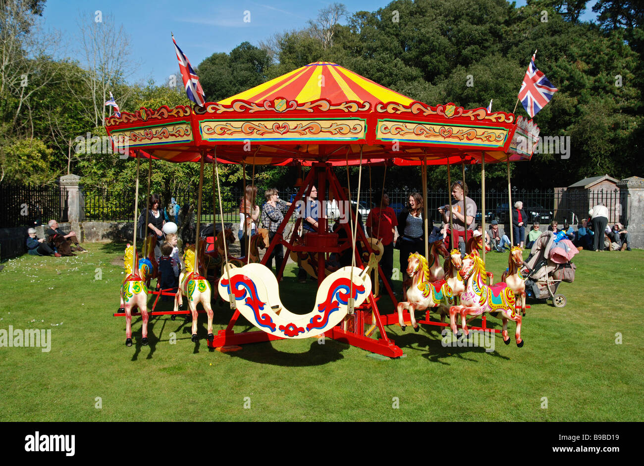a vintage merry go round at a country fair near truro in cornwall,uk Stock Photo