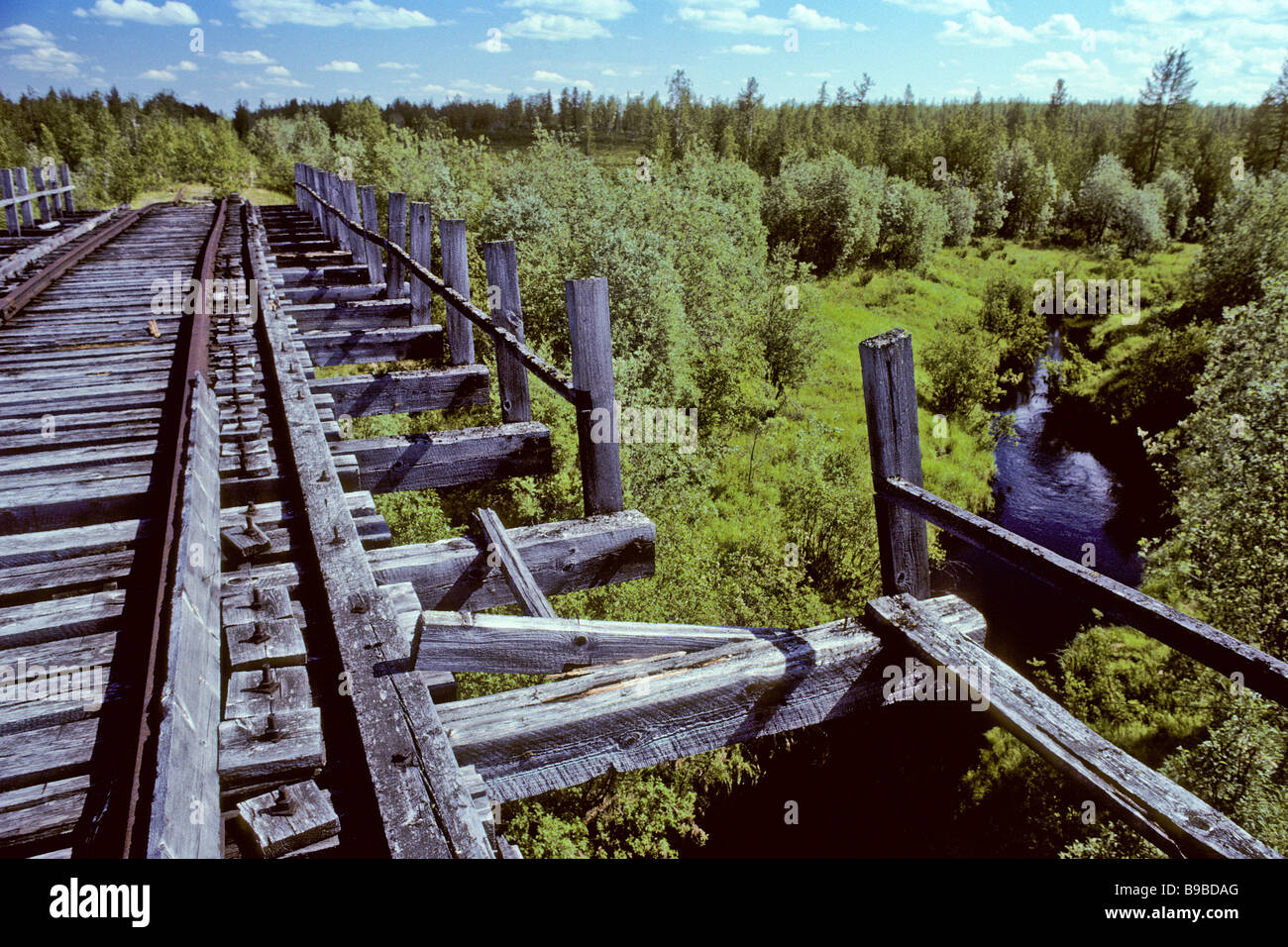 The remains of a train trestle on the Stalin era railroad known as the ...