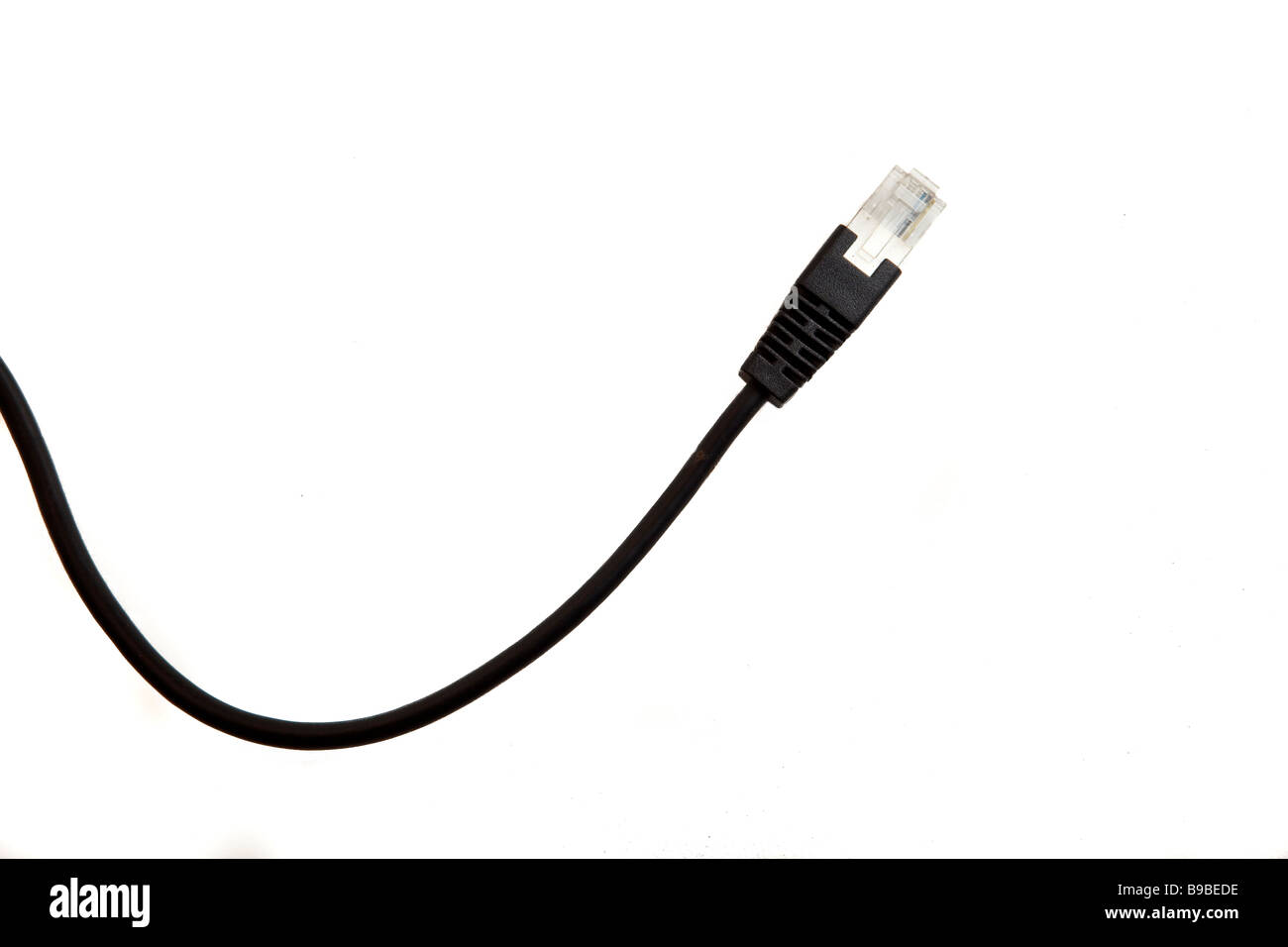 A LAN cable is seen isolated against a white background Stock Photo