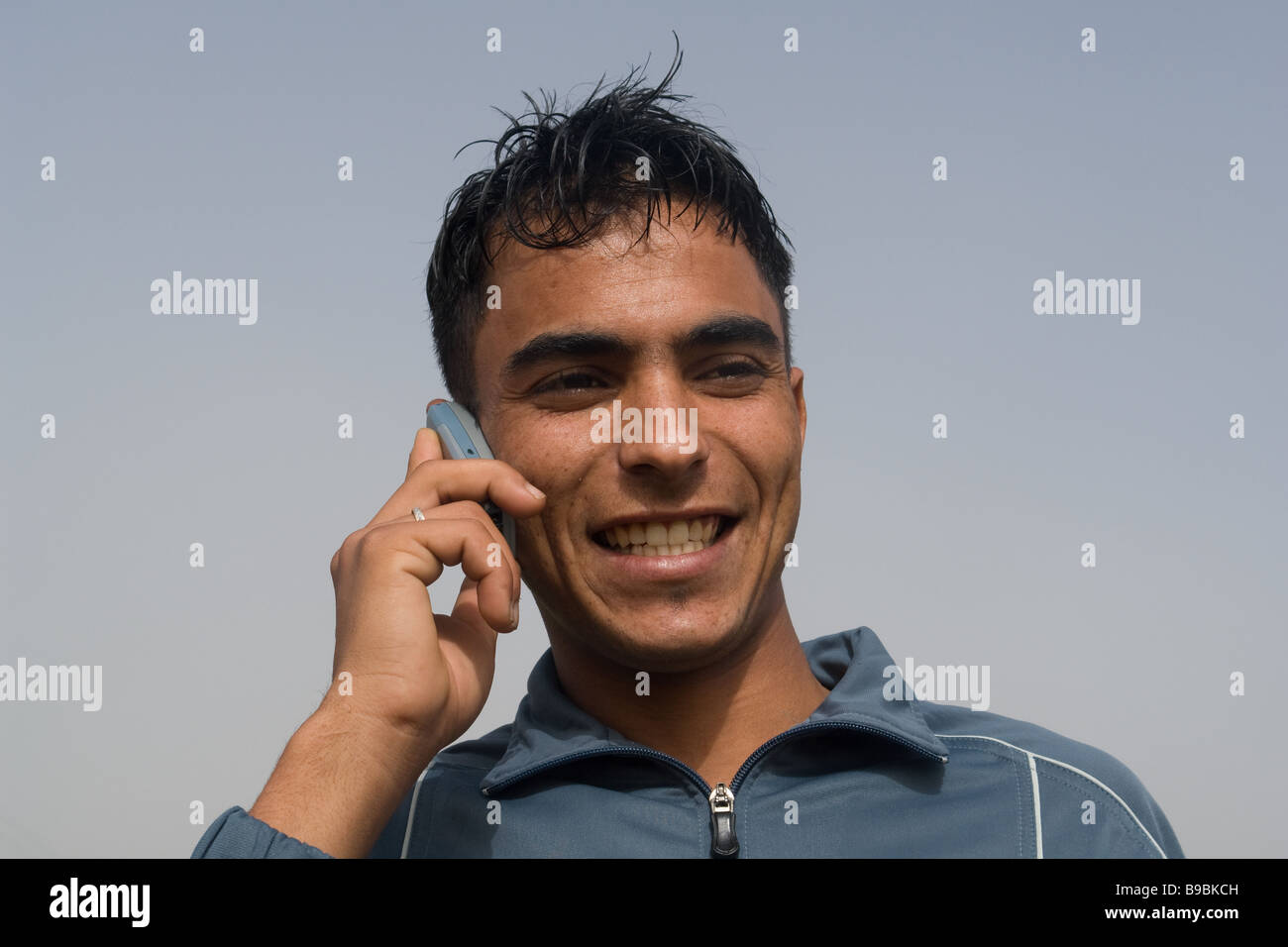 Young man phoning Stock Photo