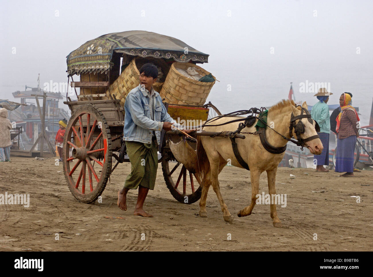 Scene in the early morning at the ferry station of Mandalay Myanmar Stock Photo