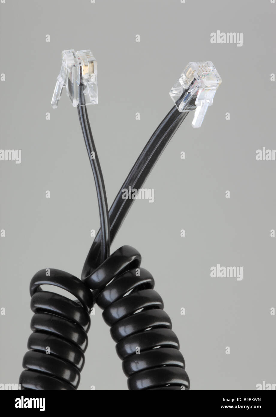 Connecting ends between a telephone and a handset Stock Photo Alamy