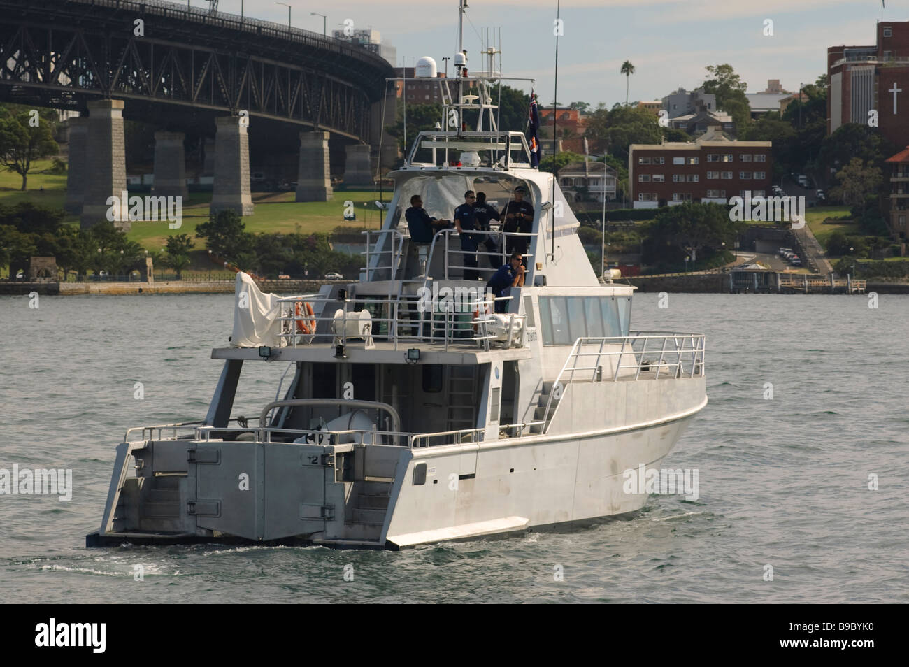 Police boat provides security for during a VIP visit to Sydney. Stock Photo