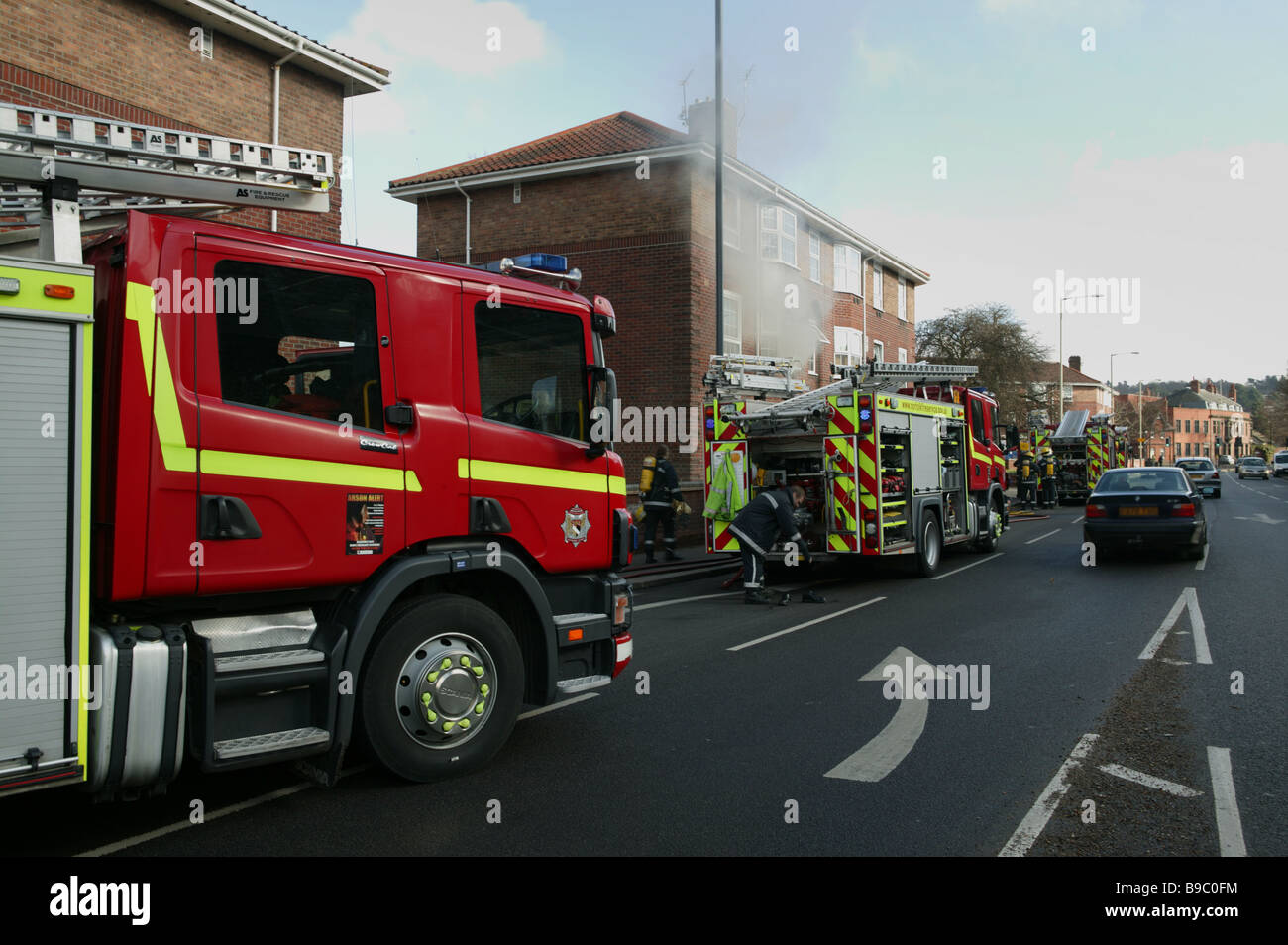 Fire crews in attendance of a house fire Stock Photo