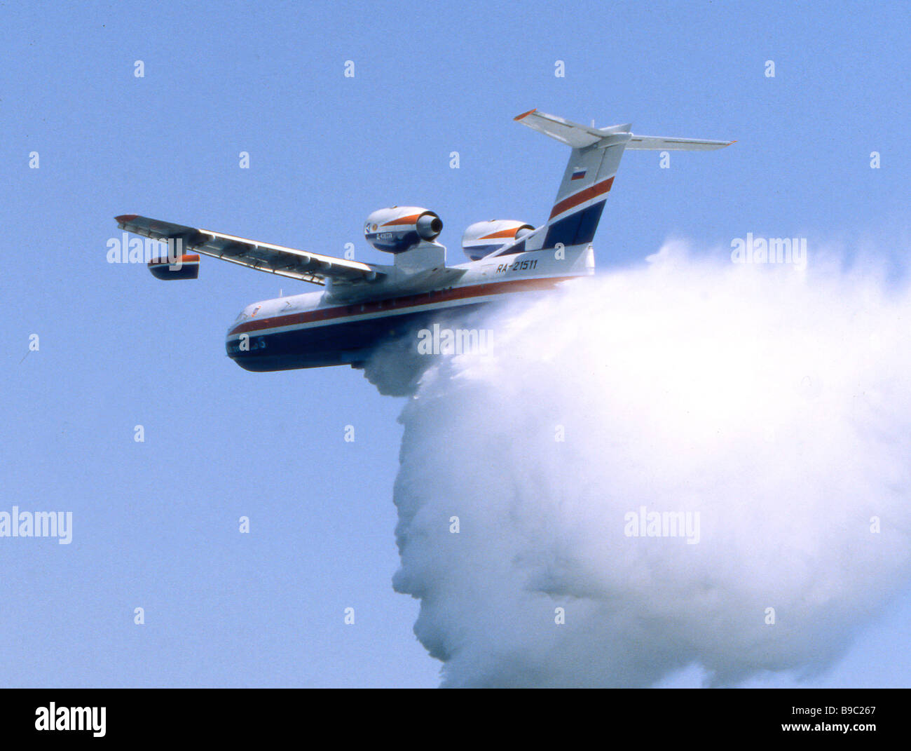 amphibious-craft-be-200-ejecting-water-while-extinguishing-fire-stock