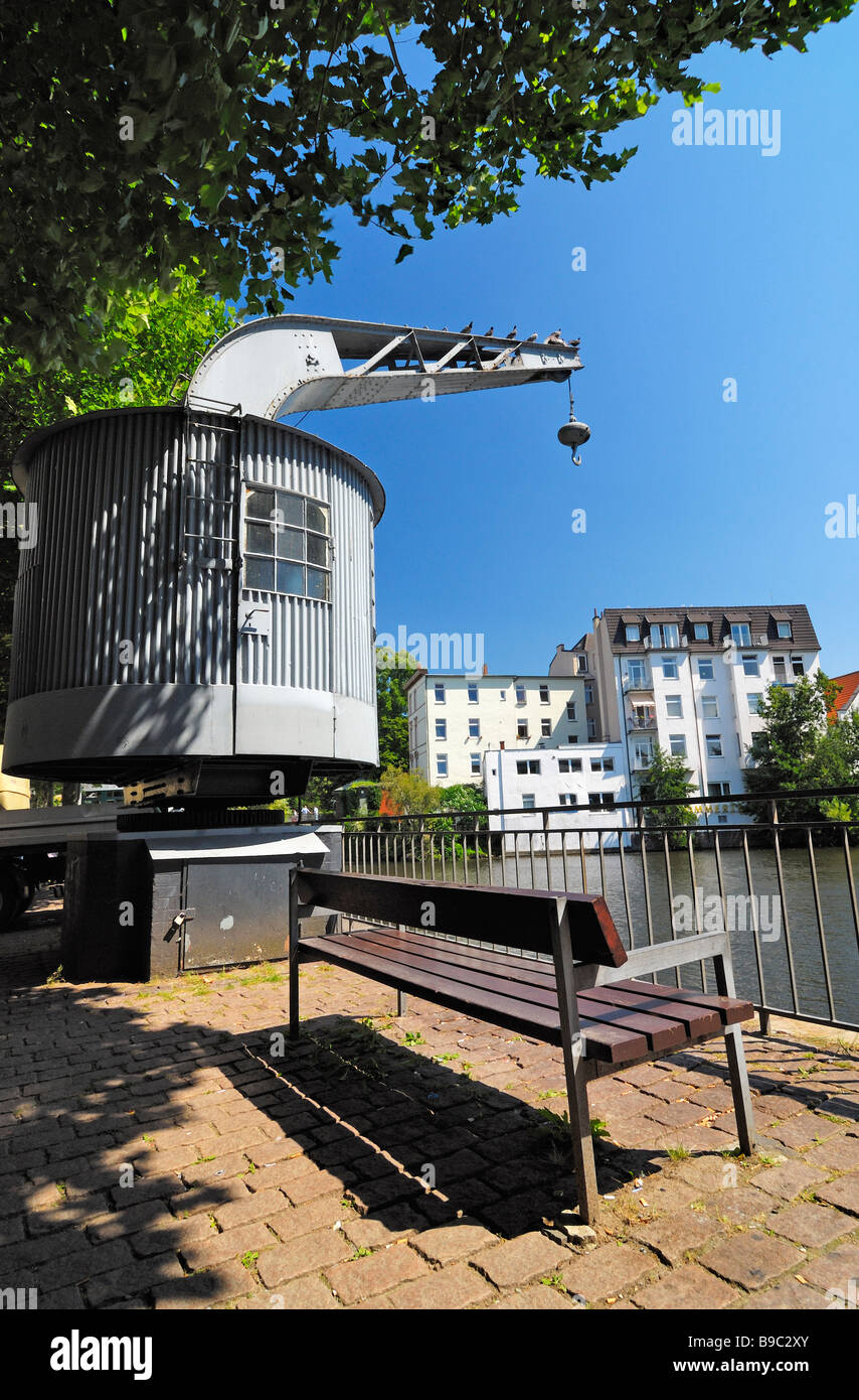 Historic crane at the waterside of the Serrahn in Bergedorf, Hamburg. Stock Photo