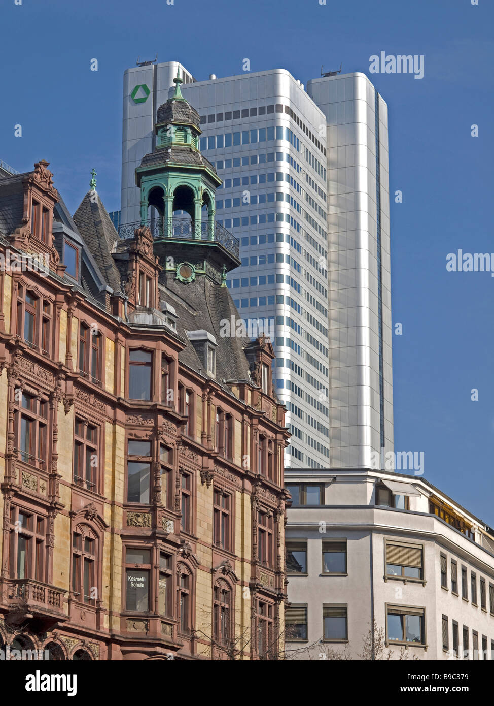 building in Wilhelminian style from the end of the 19th century in front of the building of Dresdner Bank in Frankfurt Stock Photo