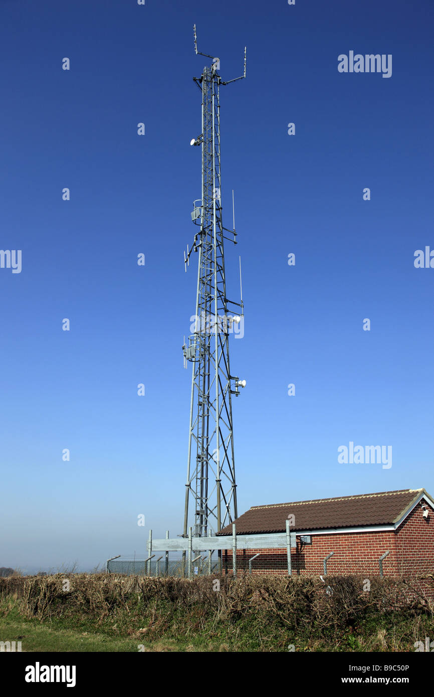 Tele communications mast with numerous Satellite dishes bolted onto the