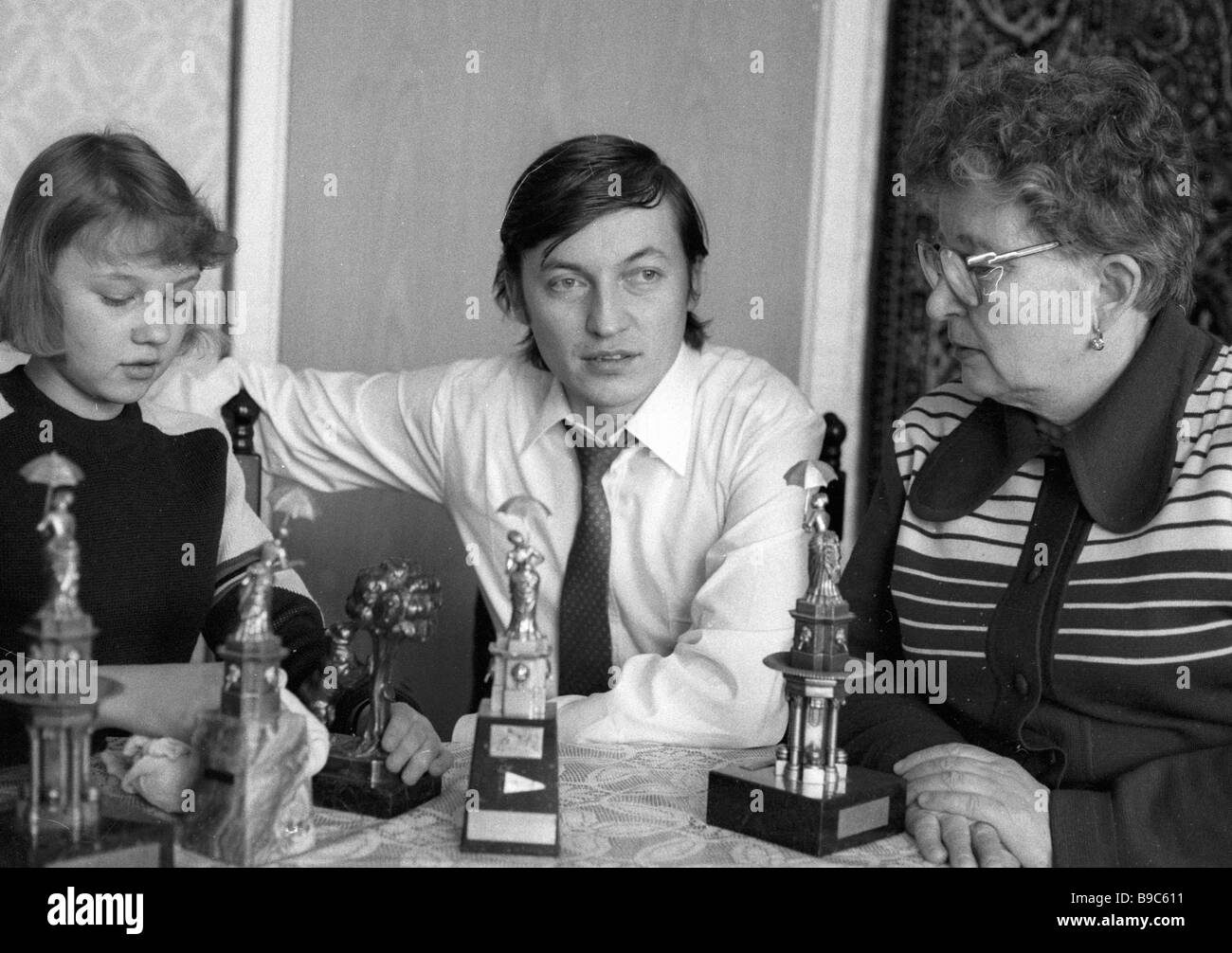 World chess champion Anatoly Karpov center with his mother Nina