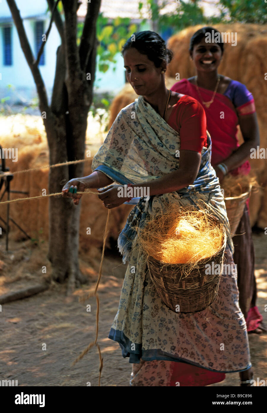 indian women making rope by hand Stock Photo - Alamy