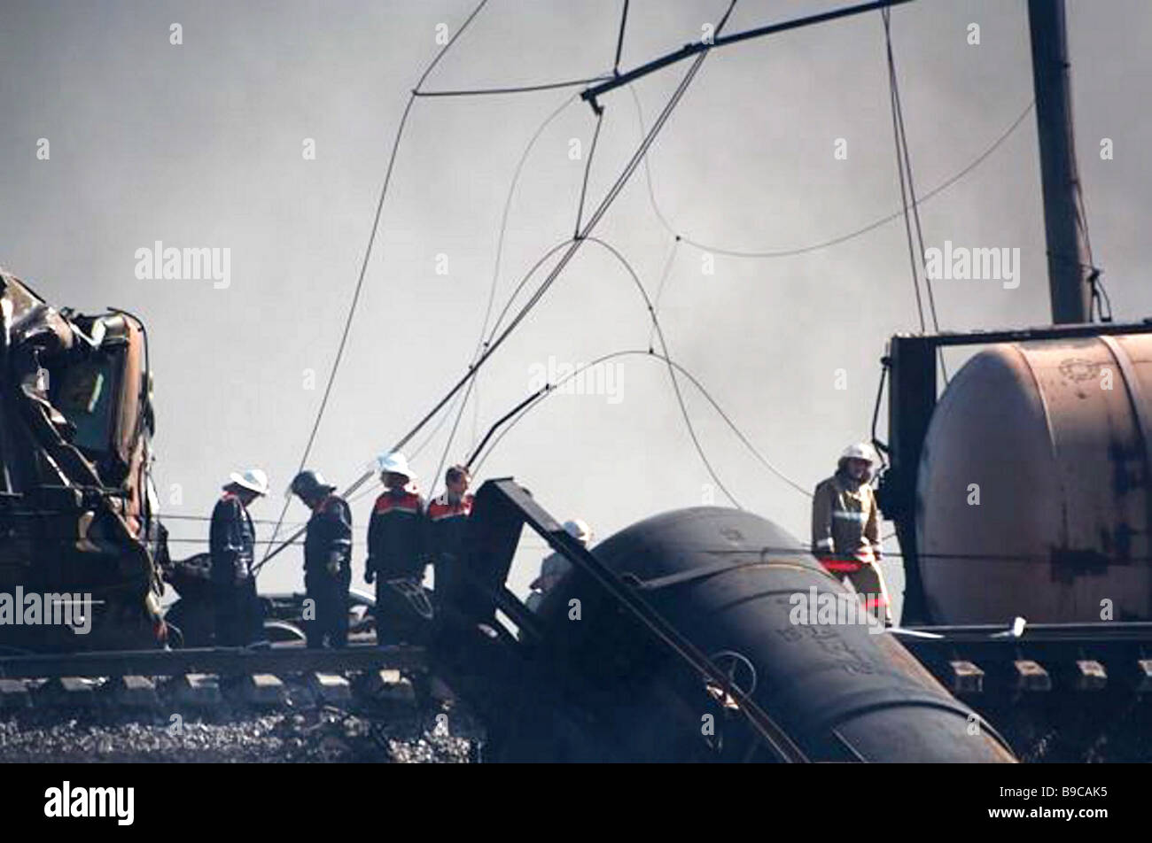 The fire service officers on the site of accident when a freight train ...