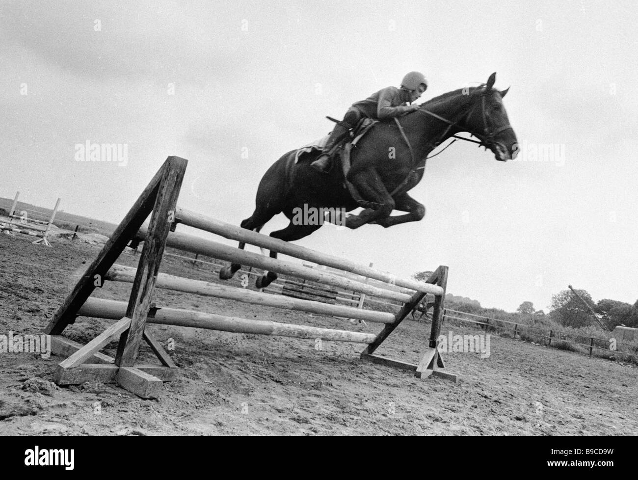Riding school show jumping class Stock Photo Alamy