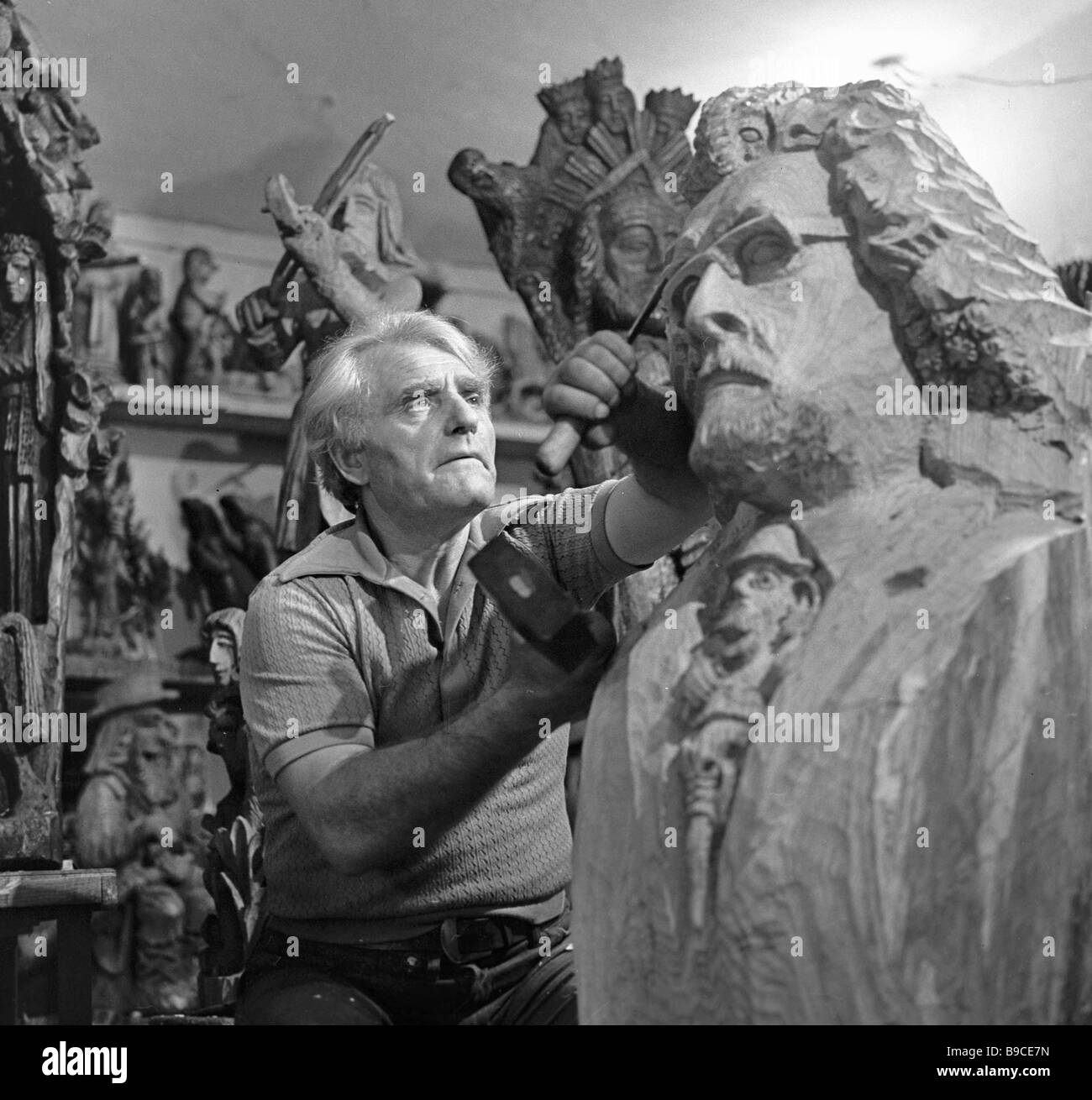 Wood carver Ipolitas Uzkurnys Lithuanian folk style artist craftsman in